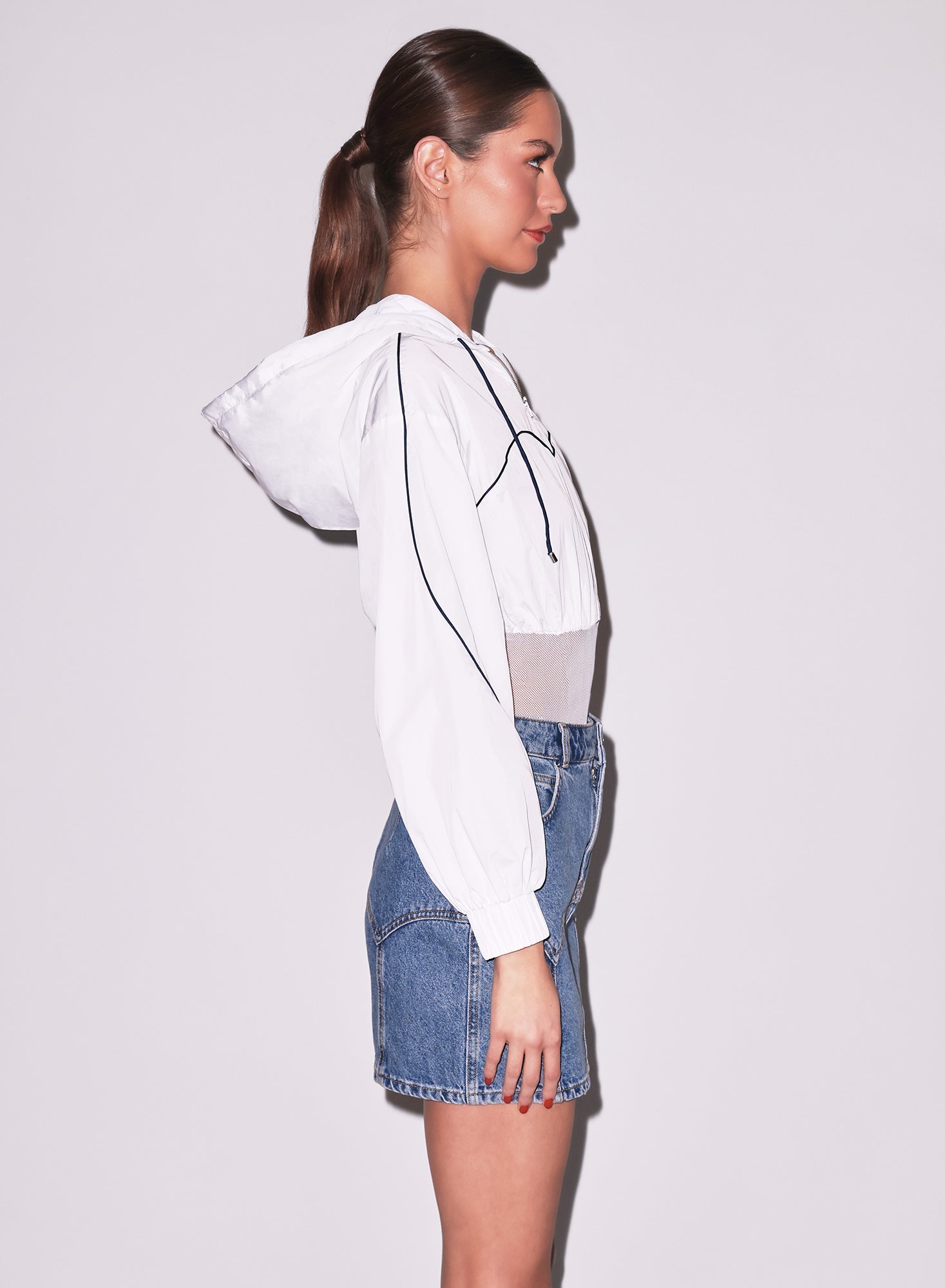 trackstar bodysuit in white with denim skirt